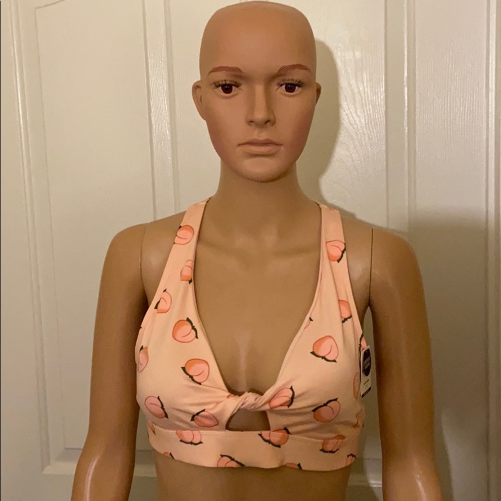 Pink Victoria’s secrets woman sports bra
